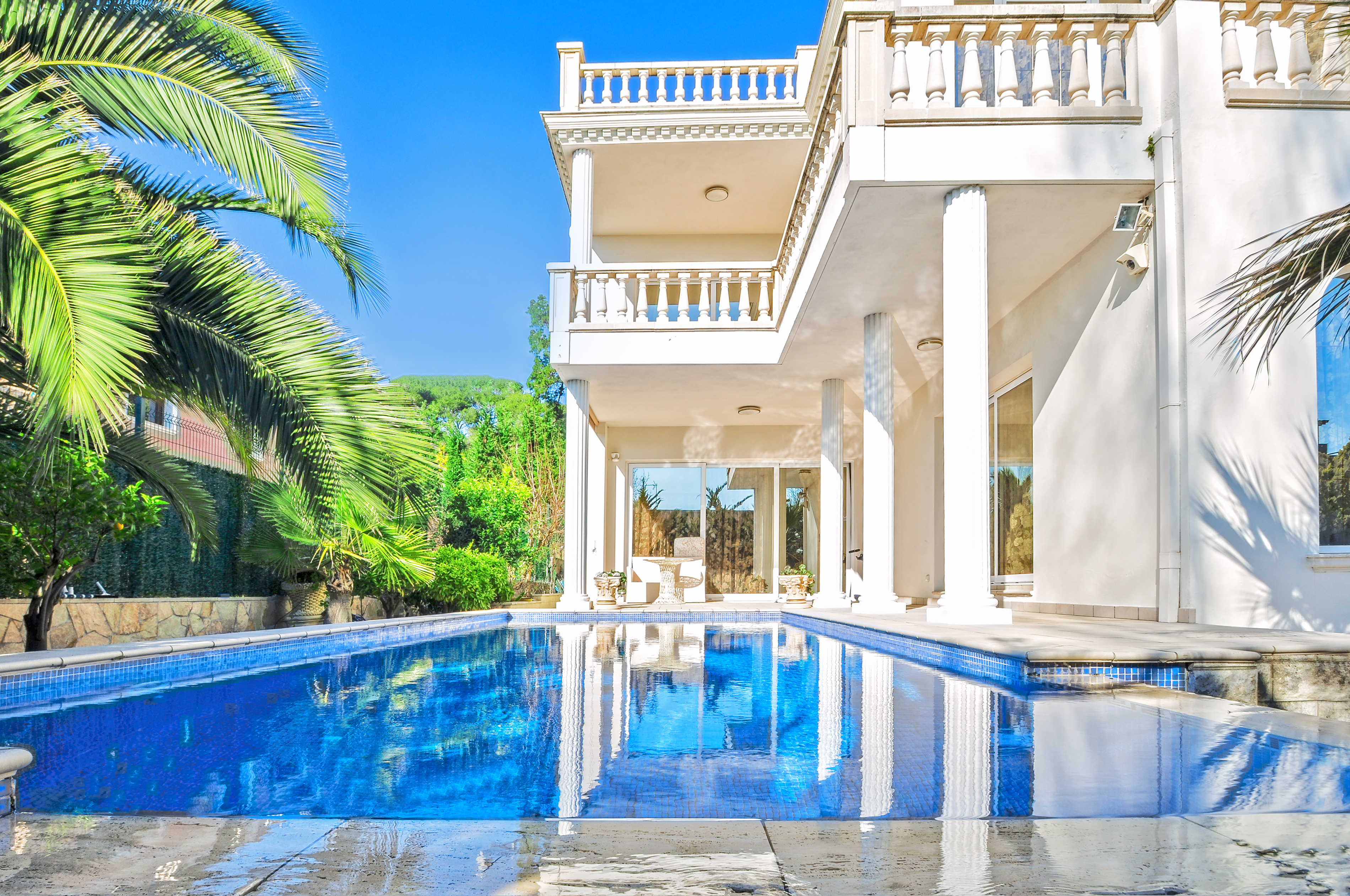 Luxury white house with swimming pool